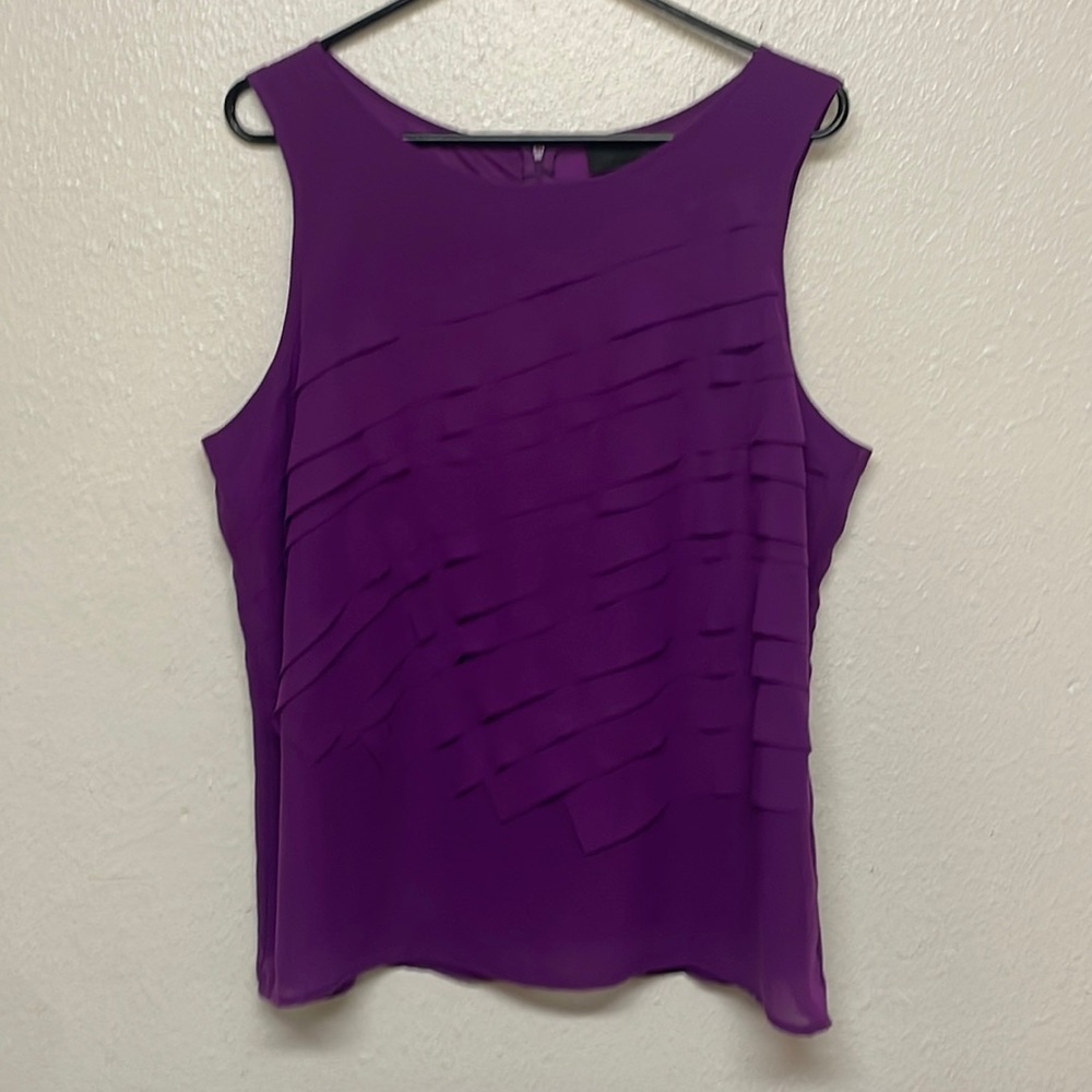 Purple ruffled sleeveless blouse